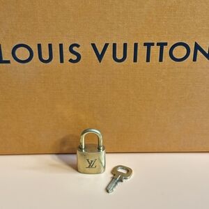 Louis Vuitton Gold Padlock with Key